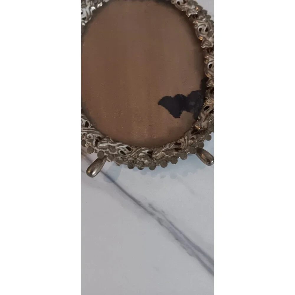 Source Unknown spots creases brushed